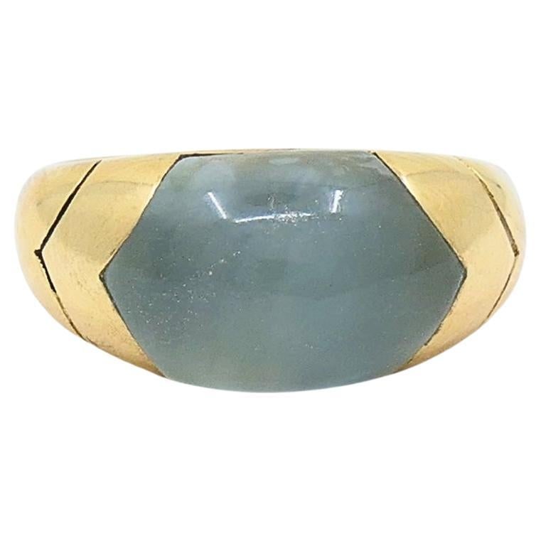 Bvlgari Bulgari 18k Gold Ring Aquamarine: About the Item A Bulgari 18k gold ring, featuring an aquamarine. The ring is created in stylized Doppio Cuore design. The gemstone set in a half dome style, offering translucent appearance and a