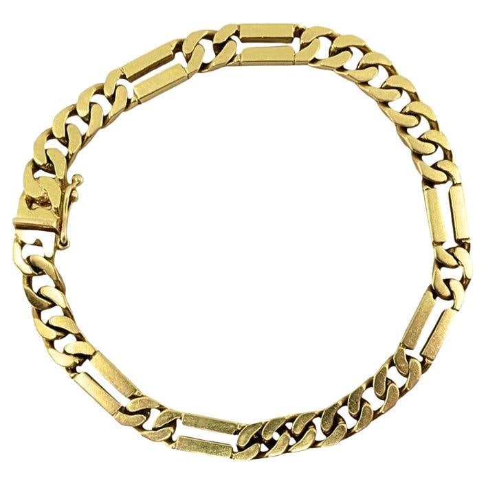 Vintage 14k Gold Chain Bracelet Curblink: About the Item A vintage 14k gold chain bracelet, featuring a series of flat curb links alternating with rectangular bars. This pattern creates a dynamic flow, making the bracelet stand out in your