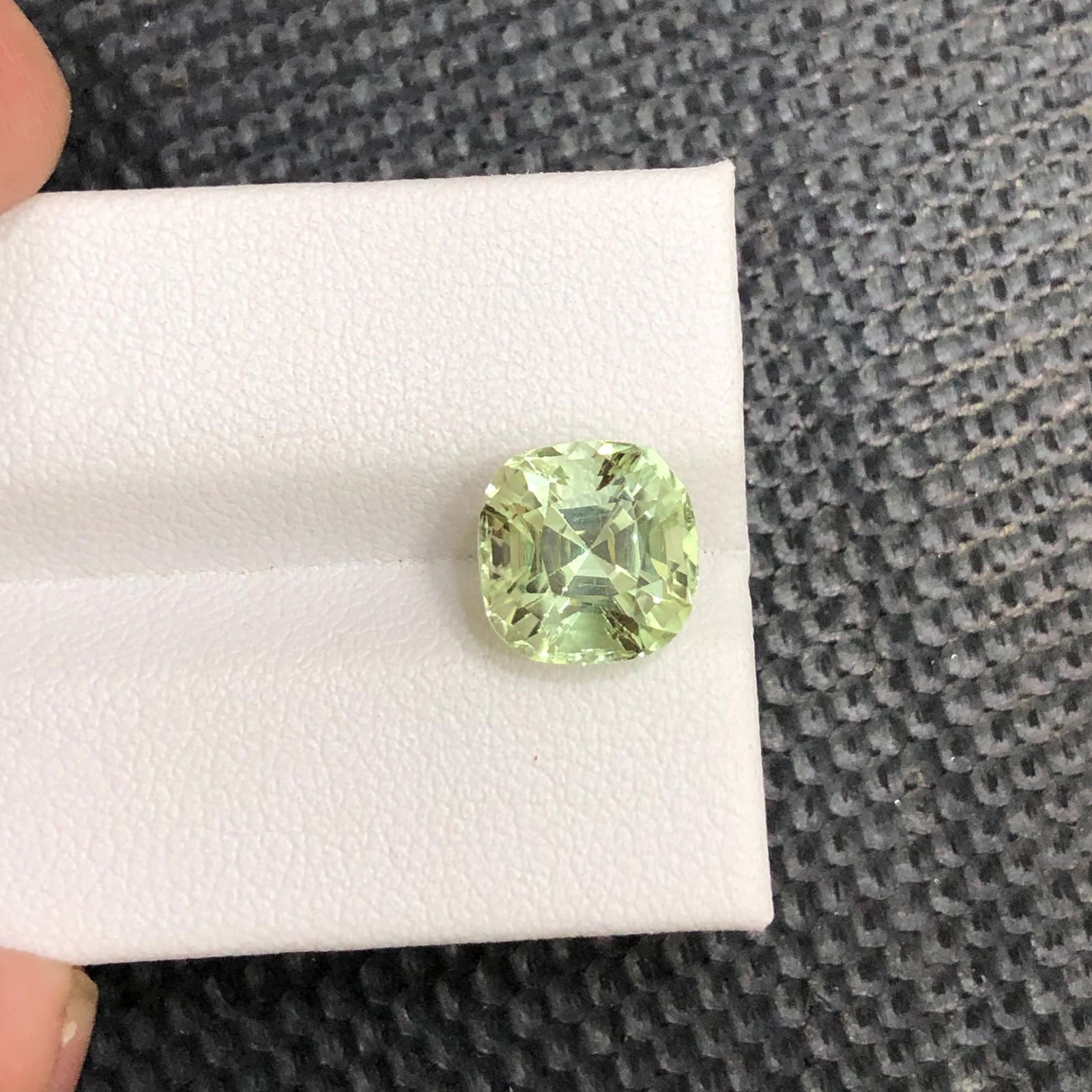 Pear Green Tourmaline Gemstone: 4.12 Carat Cushion Cut, Afghanistan Stone: Title:Pear Green Tourmaline Gemstone: 4.12 Carat Cushion Cut, Afghanistan StoneDescription:Materials: Gemstone: Tourmaline Carat weight: 4.12 Tourmaline Details: • Weight : 4.12 carat