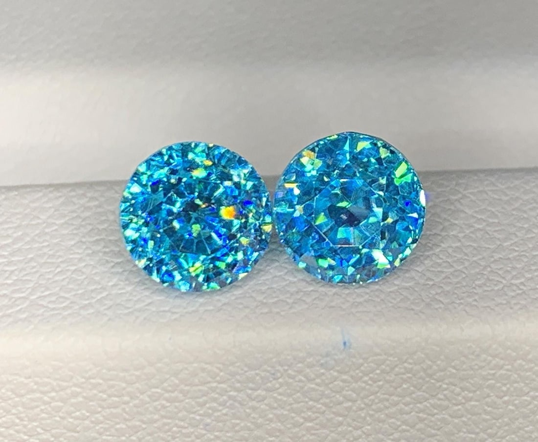 Cambodian Blue Zircon Pair Gemstone : Round Cut: Title:Cambodian Blue Zircon Pair Gemstone : Round Cut Description:Materials: Gemstone: Zircon Cambodian Blue Zircon Pair Gemstone Elevate your jewelry collection with the exquisite beauty of this Natu