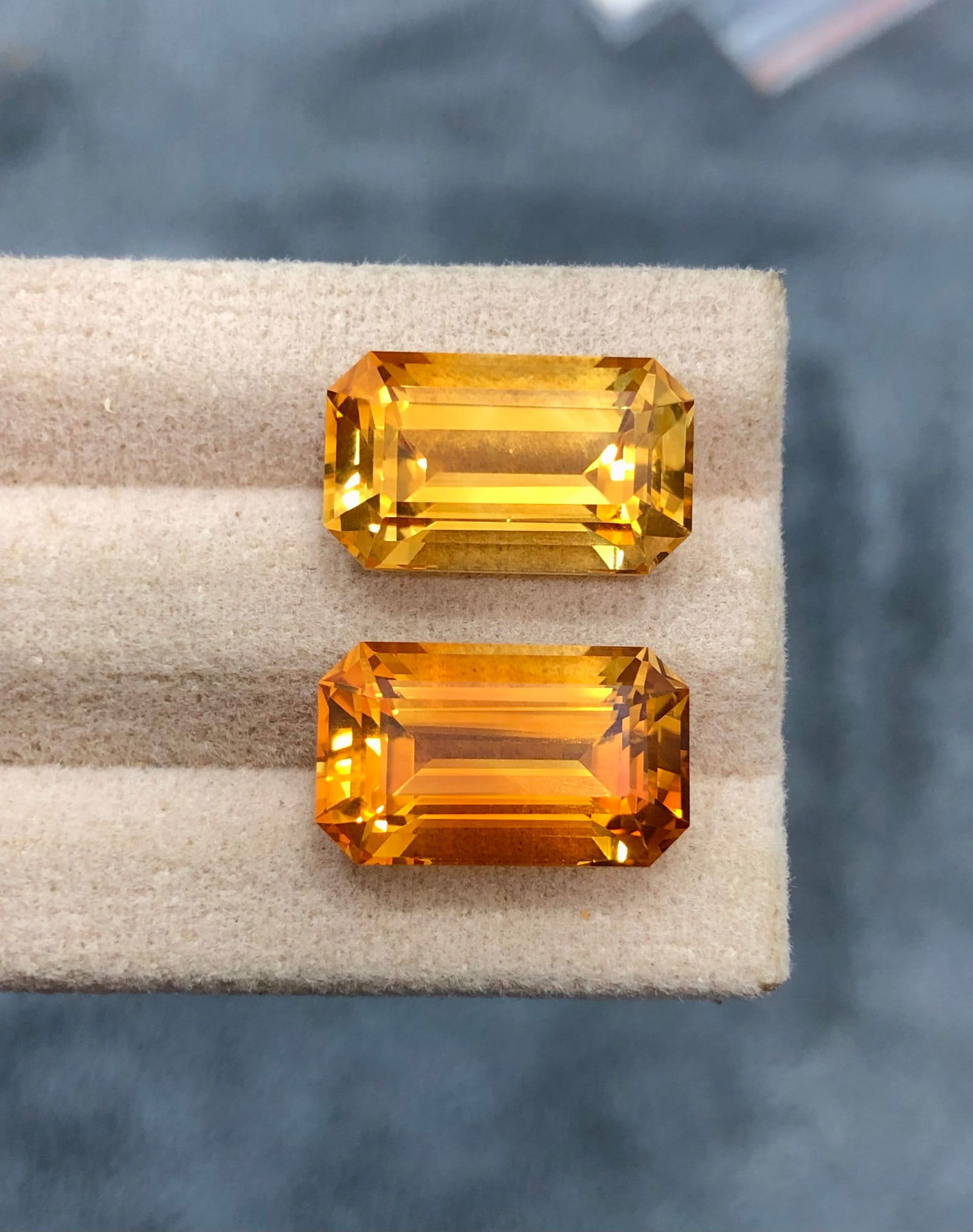16.505 Carats Madeira Citrine Pair: Details SKU Dimensions (mm) 15.6 x 9.4 x 8 mm Weight (cts) 16.505 Treatment No Treatment Shape Emerald Type Faceted Clarity N/A Colours Descripti