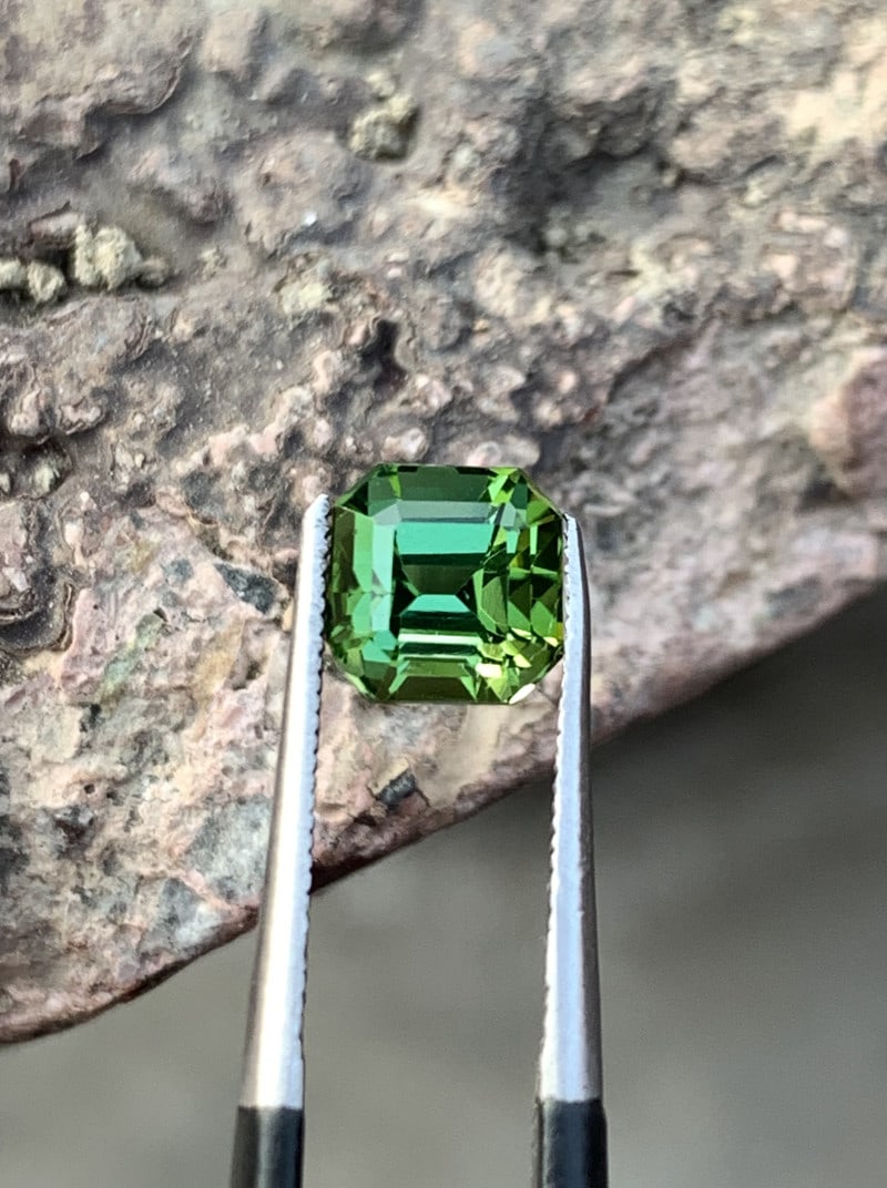 1.65 Carat Natural Asscher Cut Blue Green Tourmaline Loose Gemstone: Details SKU Dimensions (mm) 6.5 x 6.5 x 6 mm Weight (cts) 1.65 Treatment No Treatment Clarity N/A Type Faceted Shape Asscher Colours Description According to the Madras Tamil