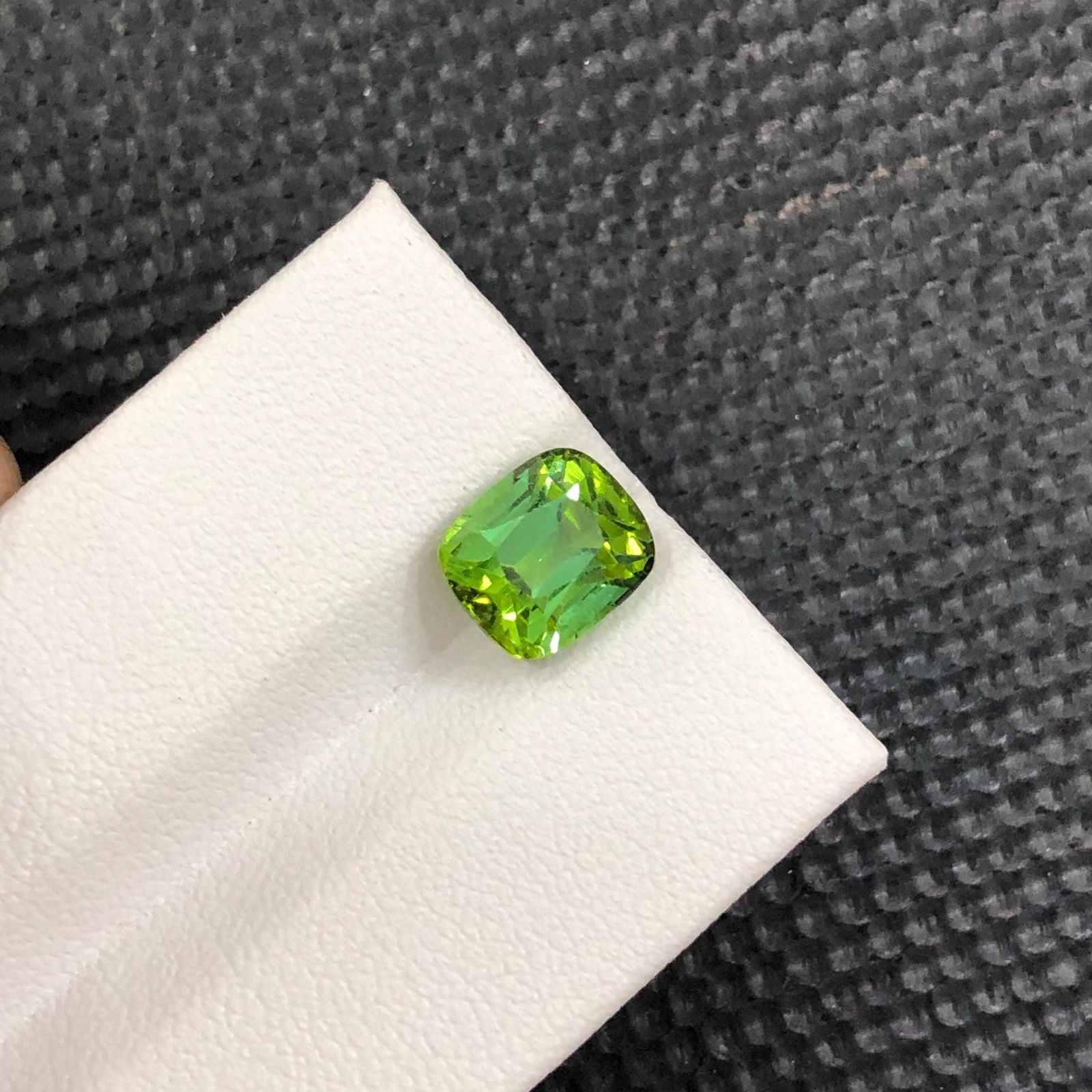 Green Tourmaline Gemstone: 2.94 Carat Cushion Cut Afghan Stone: Title:Green Tourmaline Gemstone: 2.94 Carat Cushion Cut Afghan StoneDescription:Materials: Gemstone: Tourmaline Carat weight: 2.94 Tourmaline Details: • Weight : 2.94 carat • Dimension