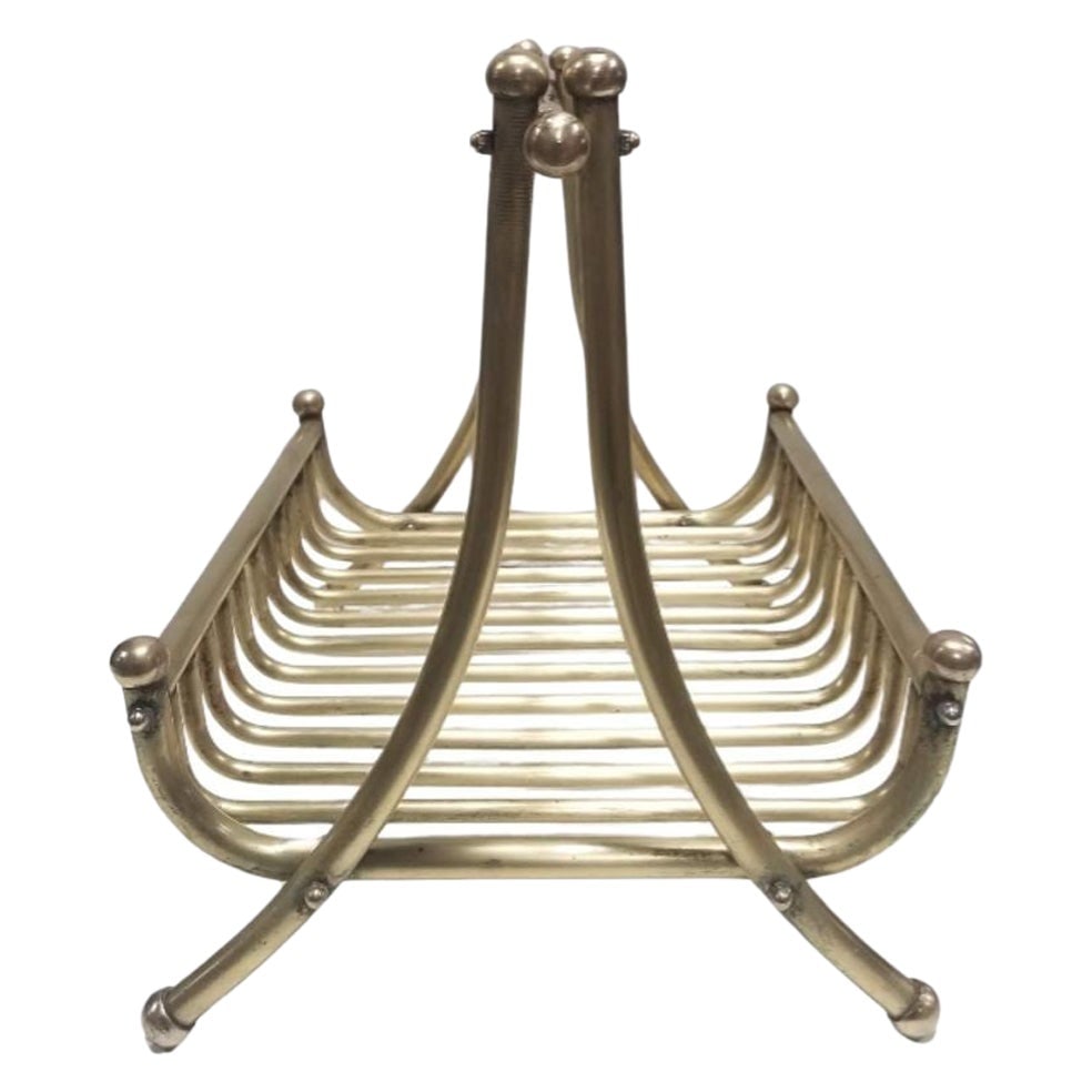 Turn of the Century Brass Newspaper Rack 1910s: Title: Turn of the Century Brass Newspaper Rack 1910s Description: Introducing our Vintage Newspaper Rack from the 1910s, a stunning piece crafted from gilded tubular design. Could also be used as a f