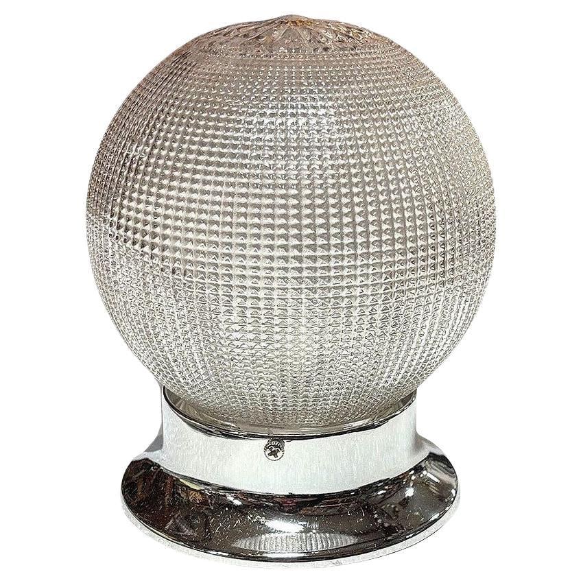 Mid-century Holophane Glass Globe Pendant Light w/ Chromes Steel Fitter: Title: Mid-century Holophane Glass Globe Pendant Light w/ Chromes Steel Fitter Description: Hollywood Regency style Holophane ceiling pendant features a classic globe-shaped glass shade that beautiful