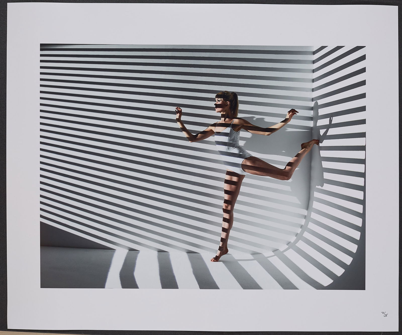 Girl w Blind Stripes_07_25_24x20 lustre: Artist: Spiros PolitisTitle:Girl w Blind Stripes_07_25_24x20 lustreDate/Period: 2013Materials:photographySize:24" x20"Description:This conceptual shot is an offshoot of an ongoing personal project