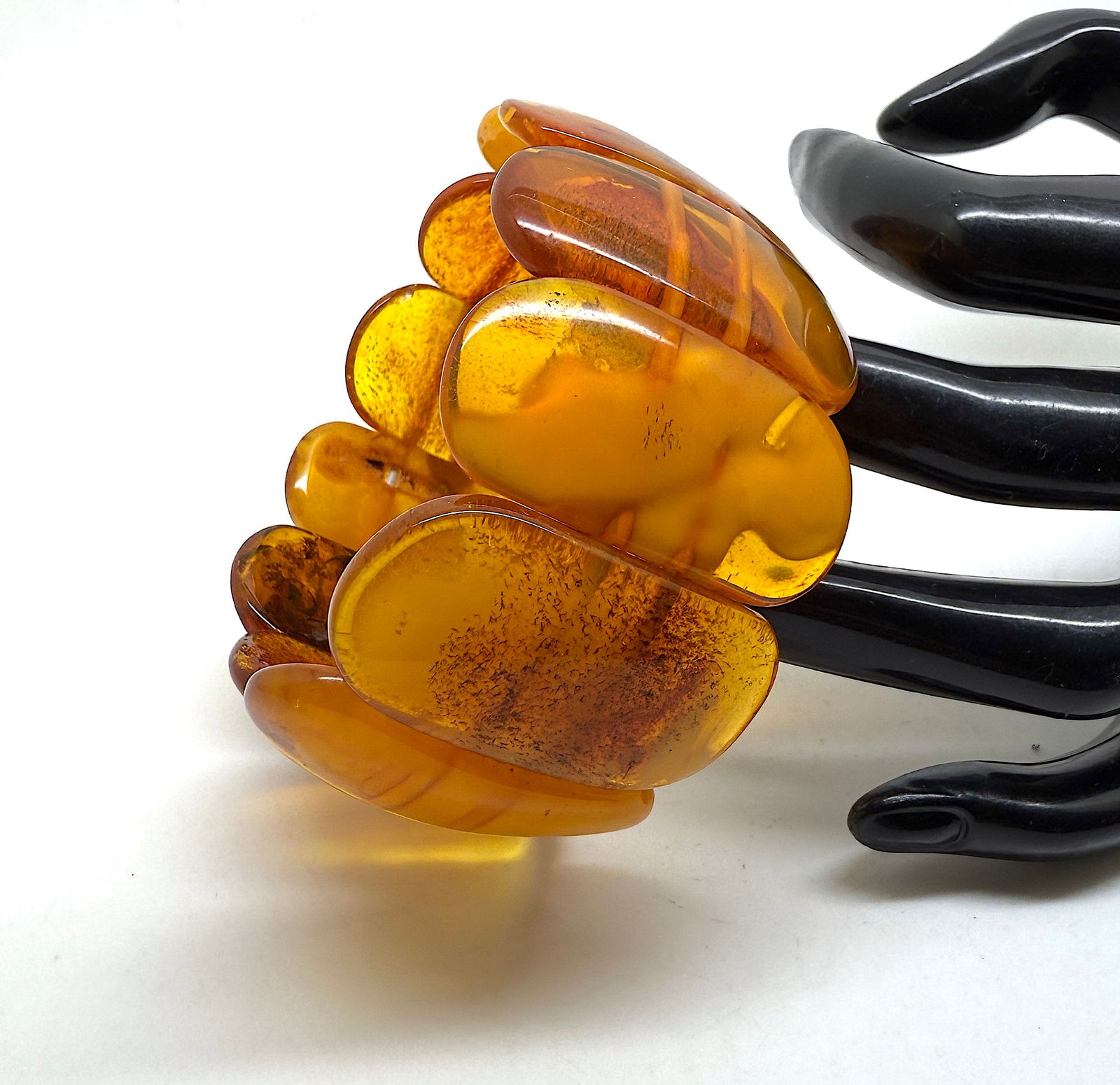 Extraordinary Vintage Amber Bracelet made from Rectangle shaped Amber beads: Title:Extraordinary Vintage Amber Bracelet made from Rectangle shaped Amber beads Metal:None Gemstone:Amber Weight:34.4 g Size:Bead size: 30.0 x 40.0 mm Bead size: 1.181 x 1.575 inches Made of:(Recons