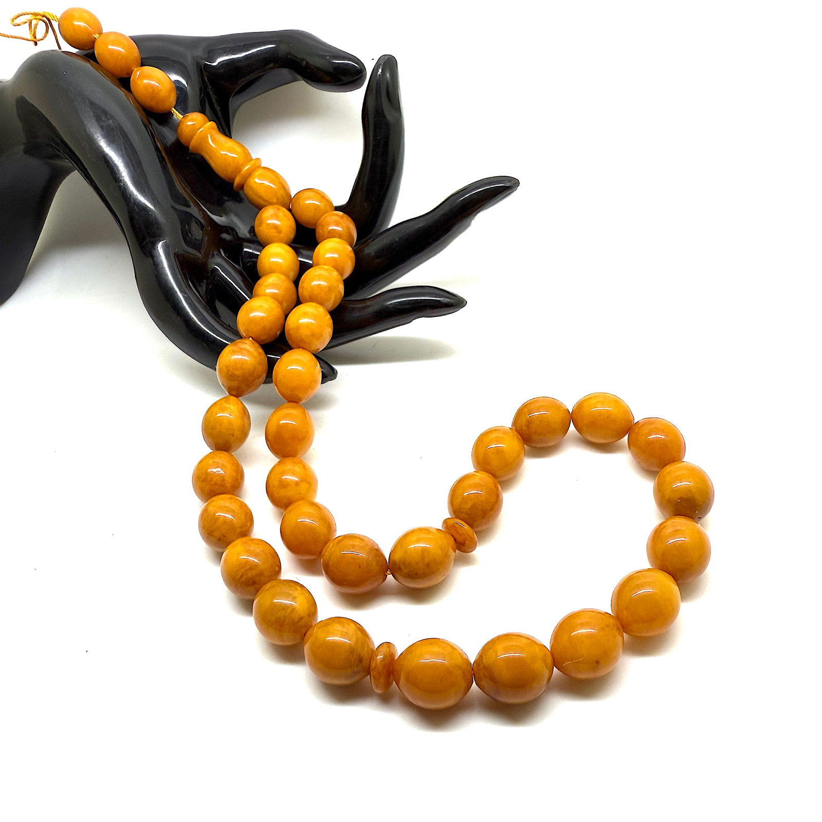 Impressive Amber Tesbih made from Olive shaped Amber beads: Title:Impressive Amber Tesbih made from Olive shaped Amber beads Metal:None Gemstone:Amber Weight:30.0 g Size:Bead size: 12.0 x 10.0 mm Bead size: 0.472 x 0.394 inches Made of:(Reconstituted Amber or
