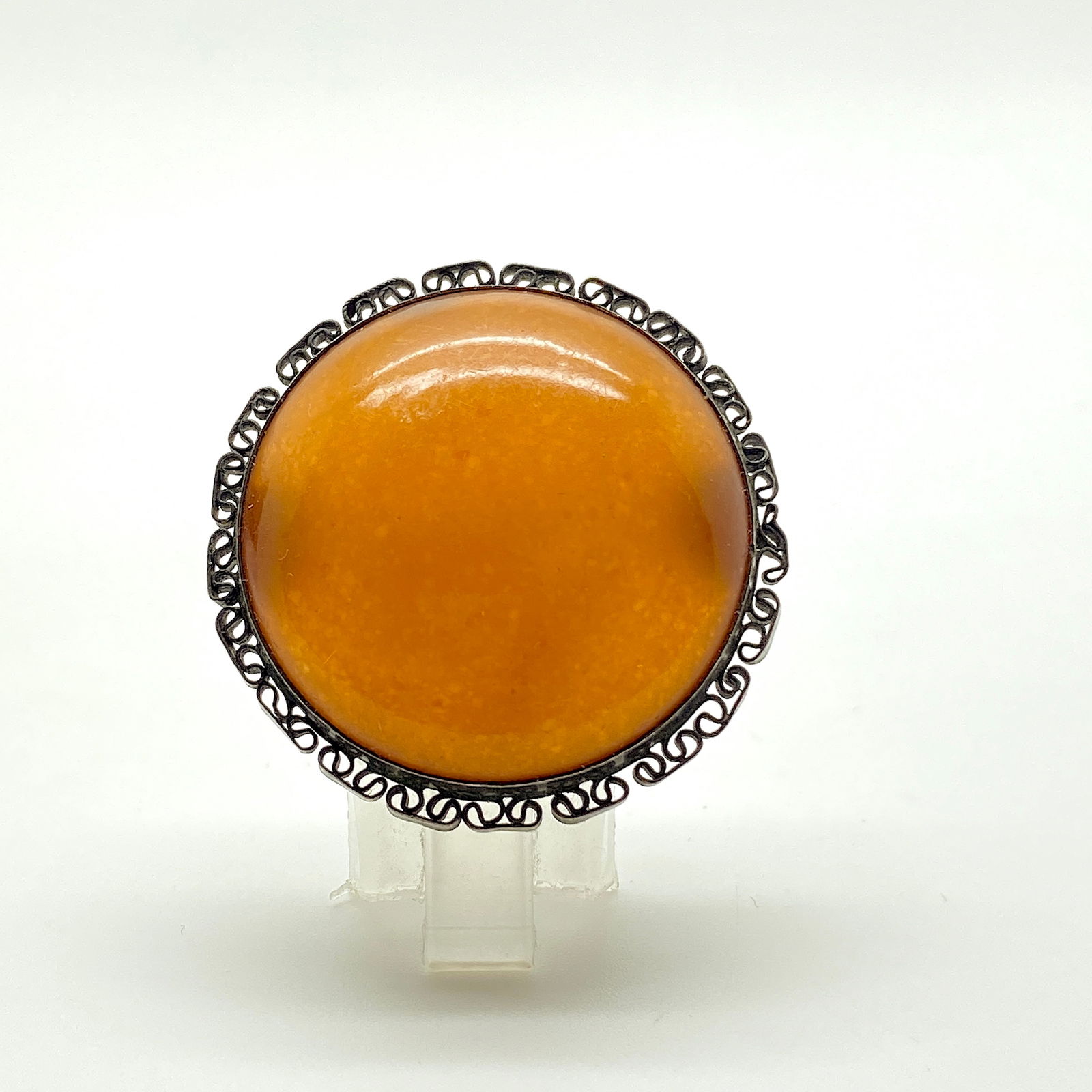 Alluring Vintage Amber Brooch: Title:Alluring Vintage Amber Brooch Metal:Silver 875 Gemstone:Amber Weight:7.9 g Size:Size: 35.0 x 35.0 x 10.0 mm Size: 1.378 x 1.378 x 0.394 inches Made of:(Reconstituted Amber or Whole Stone):Recons