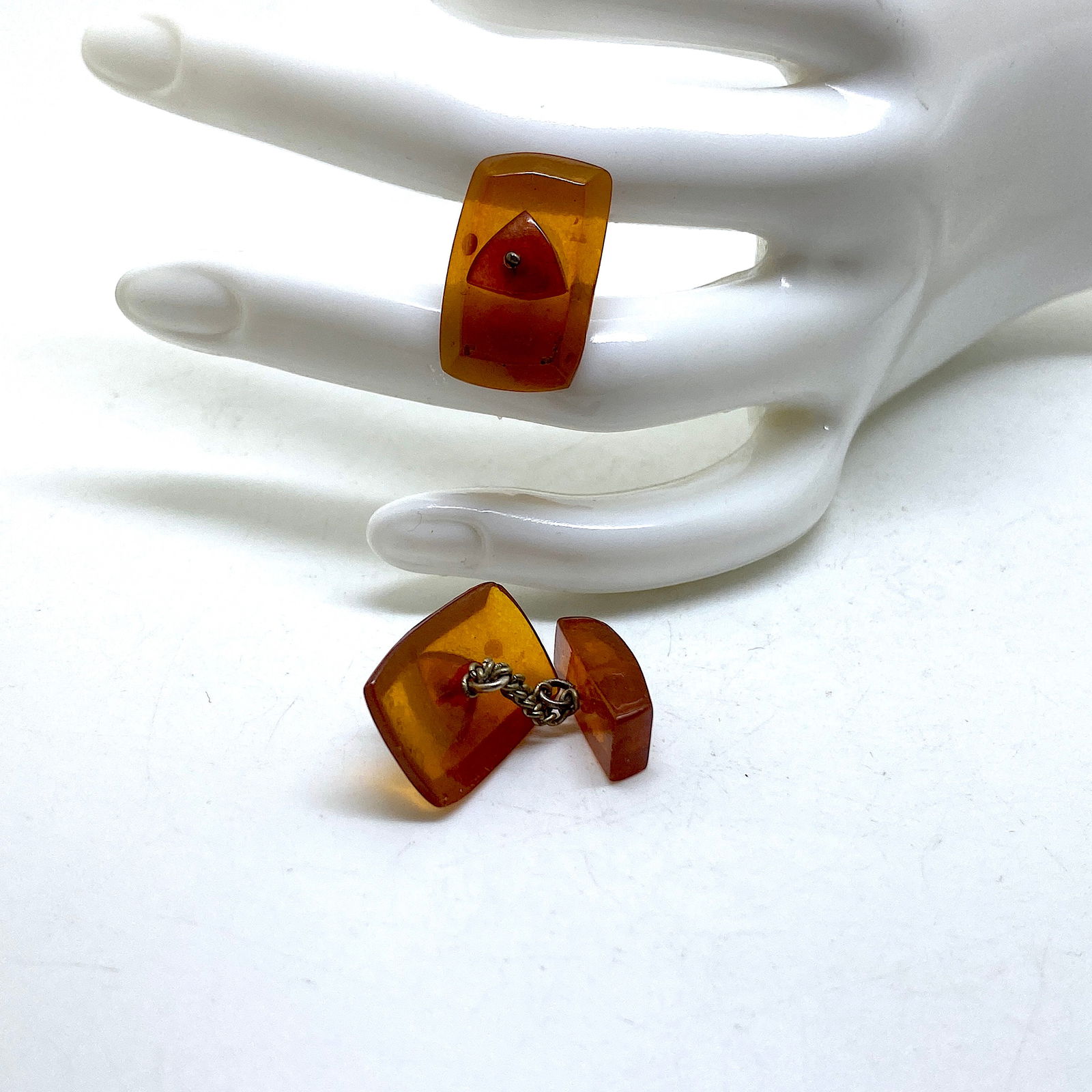 Magnificent Vintage Amber Cufflinks: Title:Magnificent Vintage Amber CufflinksMetal:NoneGemstone:AmberWeight:4.05 gSize:Size: 23.0 x 19.0 x 27.0 mm Size: 0.906 x 0.748 x 1.063 inches Made of:(Reconstituted Amber or Whole Stone):Whole