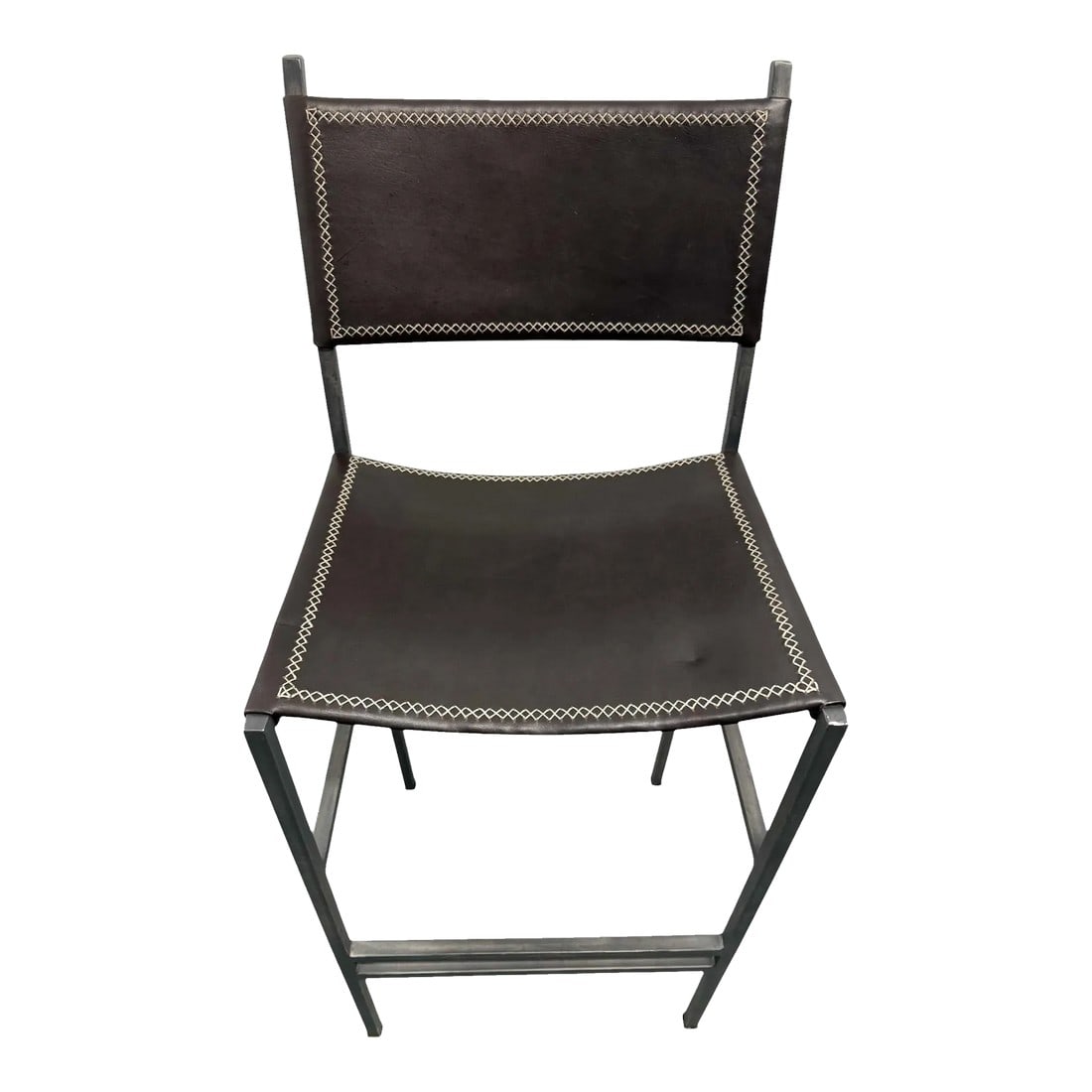 Sol & Luna Brown Leather and Iron Bar Stool: Quick Hits: - Sol Luna Tan Leather and Iron Bar Stool - Features tan leather with contrasting iron frame - Stitched leather detailing adds texture and dimension - Perfect for modern kitchens, home bar