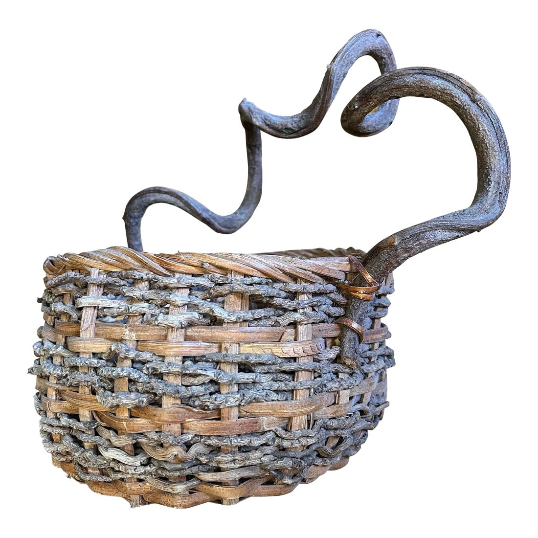 Early 20th Century Vintage Basket with Twisted Vine Handle: This antique rustic gathering basket is a vintage woven piece of art with a unique charm and character. This is a Stunning, unique and rustic item! Made of vine and wood materials, shape and size