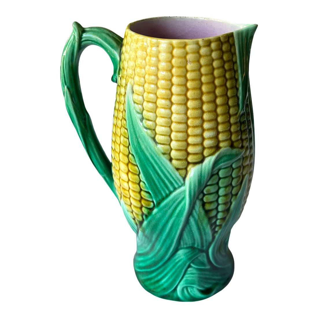 Antique 19th Century George Jones English Majolica Corn Pitcher: A charming 19th-century English majolica by famed maker George Jones. This vintage corn pitcher is brimming with countryside character and botanical whimsy. The pitcher is molded in high relief to