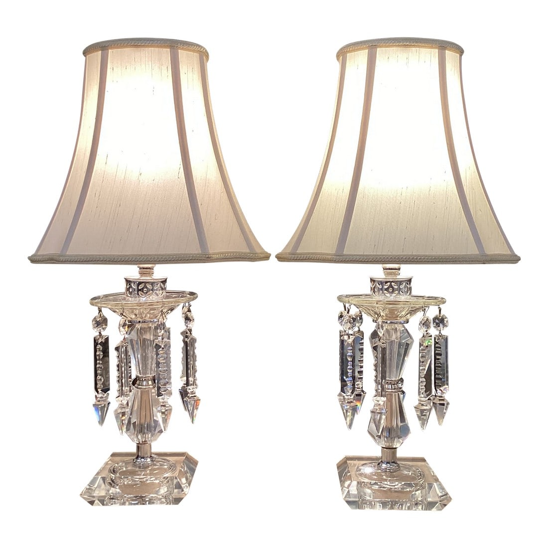 Pair of Vintage Crystal Prism Table Lamps – Fully Rewired: Elegant pair of vintage crystal table lamps featuring faceted crystal bodies, square crystal bases, and cascading prism drops that catch and refract the light beautifully. Each lamp is topped with
