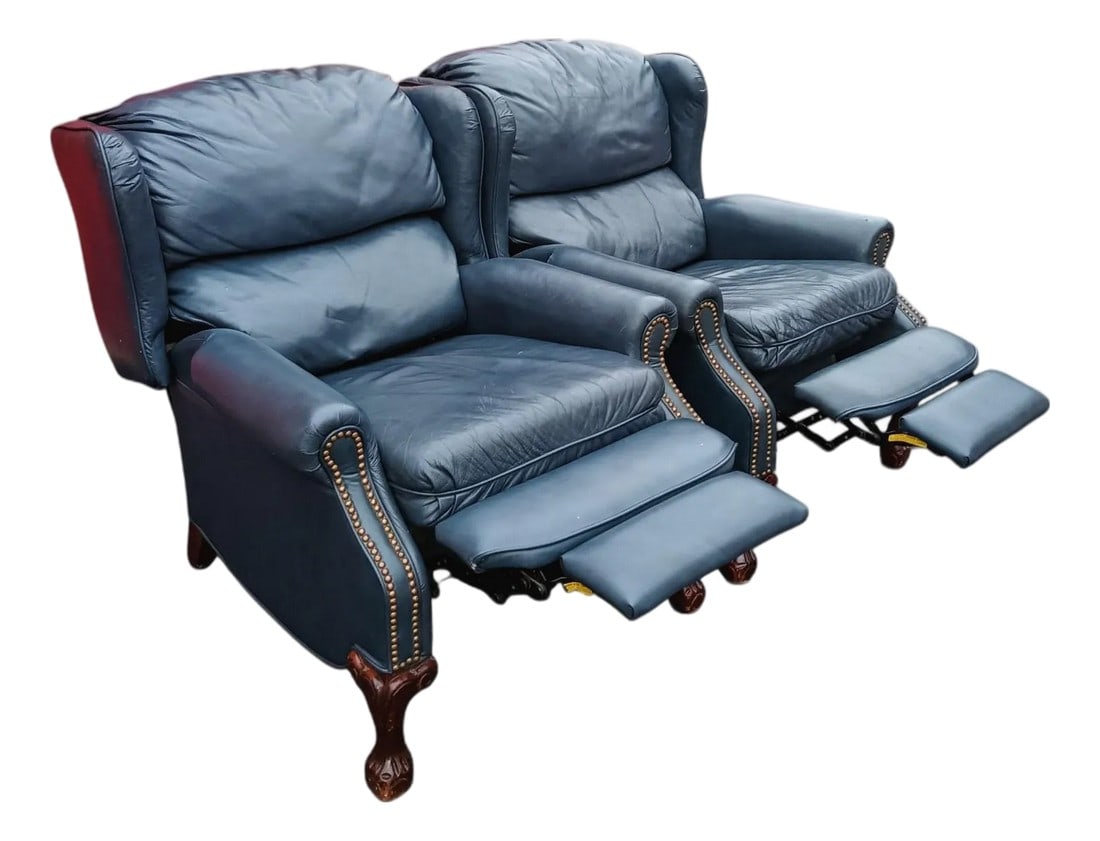 Experience the Comfort & Design With a Pair of the Cleveland Chair Ball & Claw Leather Recliners: Crafted in the USA, these luxurious pieces are more than just chairs; they are an investment in quality and relaxation. Unmatched Craftsmanship: Upholstered in a rich "blue" Class 2 top-grain