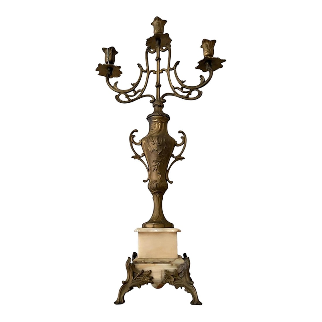 Pair of Antique Italian Bronze Candelabras With Marble Bases – 25" Tall: An elegant pair of antique Italian bronze candelabras featuring scrolling Rococo arms and richly detailed urn-form stems, each raised on a carved marble pedestal base. Each candelabra rises to