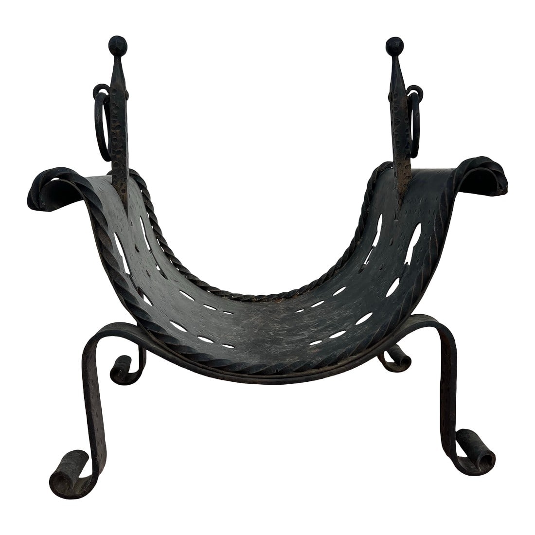 Vintage Cast Iron Fireplace Firewood Holder: Fireplace Log Holder Vintage wrought iron fireplace log holder basket. Forged or wrought iron. Designed to hold firewood neatly beside a fireplace.Features a cradle shape with scrollwork,