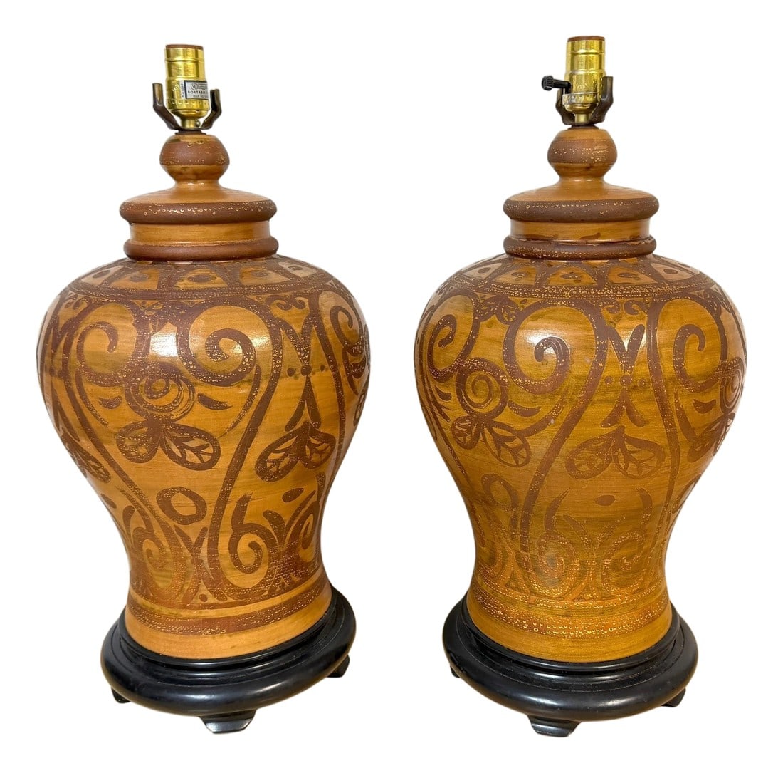 Pair Italian Mid-Century Slip-Decorated Sgraffito Pottery Lamps , C. 1960s: Pair of Italian Mid-Century Slip-Decorated Sgraffito Pottery Lamps on Blackened Wood Bases This refined pair of Italian mid-century pottery lamps exemplifies the period's celebrated fusion of