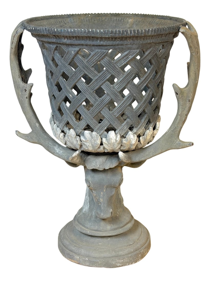Monumental J.W. Fiske–Attributed Polychromed Lead Stag-Head Reticulated Urn: This monumental J.W. Fiske–attributed polychromed lead urn represents a sophisticated synthesis of 19th-century American garden ornament, classical revival taste, and the naturalistic symbolism