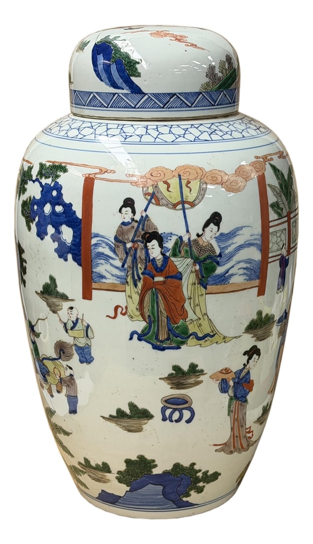 Oriental Color Family Gathering Graphic White Base Porcelain Jar: This large, ovoid-shaped porcelain ginger jar features a vibrant, wrap-around narrative scene rendered in a palette of cobalt blue, coral-red, and various shades of green and yellow. The central