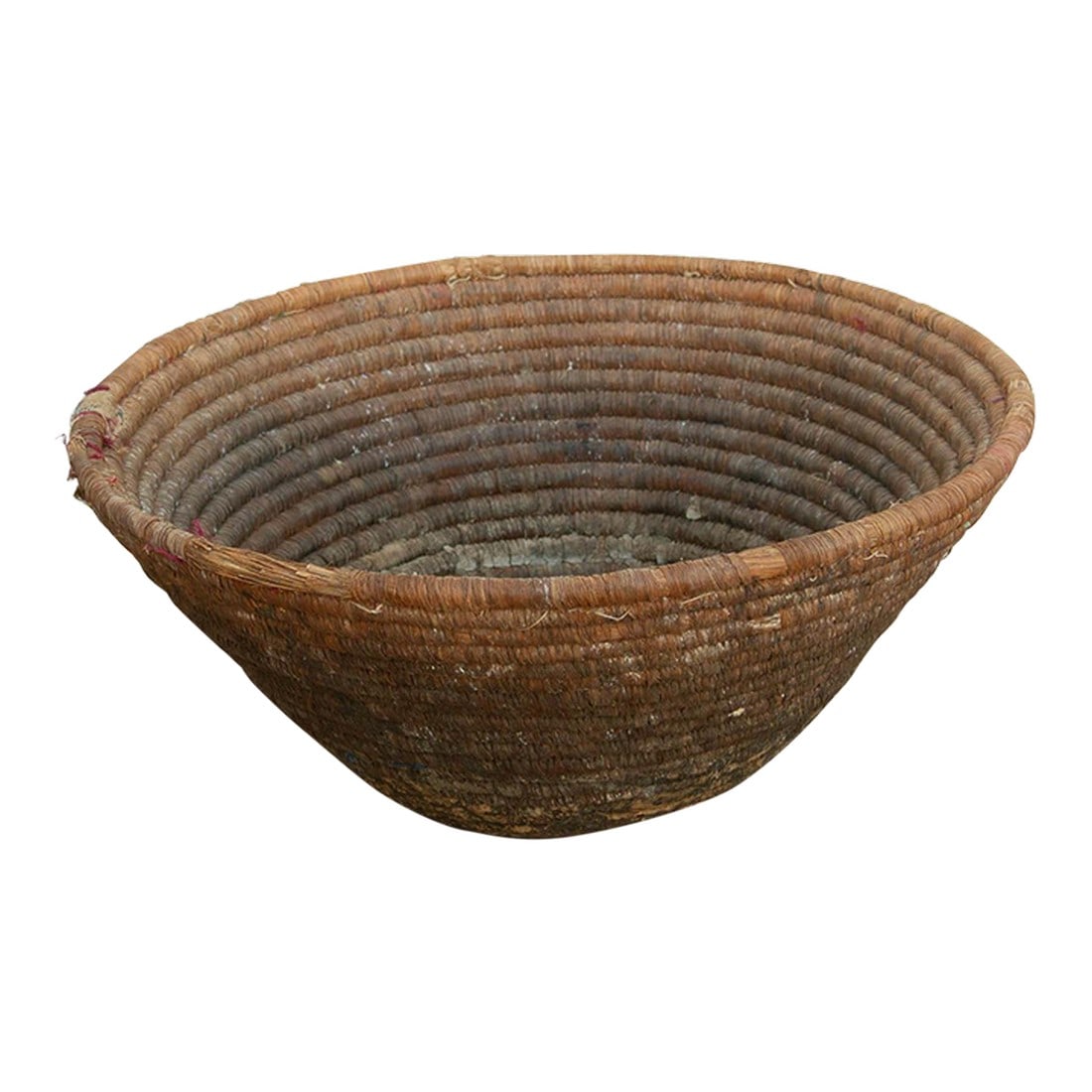 Antique Mud Sealed Harvest Bowl: This deeply patinated nomadic harvest bowl is a stunning artifact of daily tribal life. In traditional agrarian societies, sturdy baskets of this mid-sized scale were the quintessential tools of the