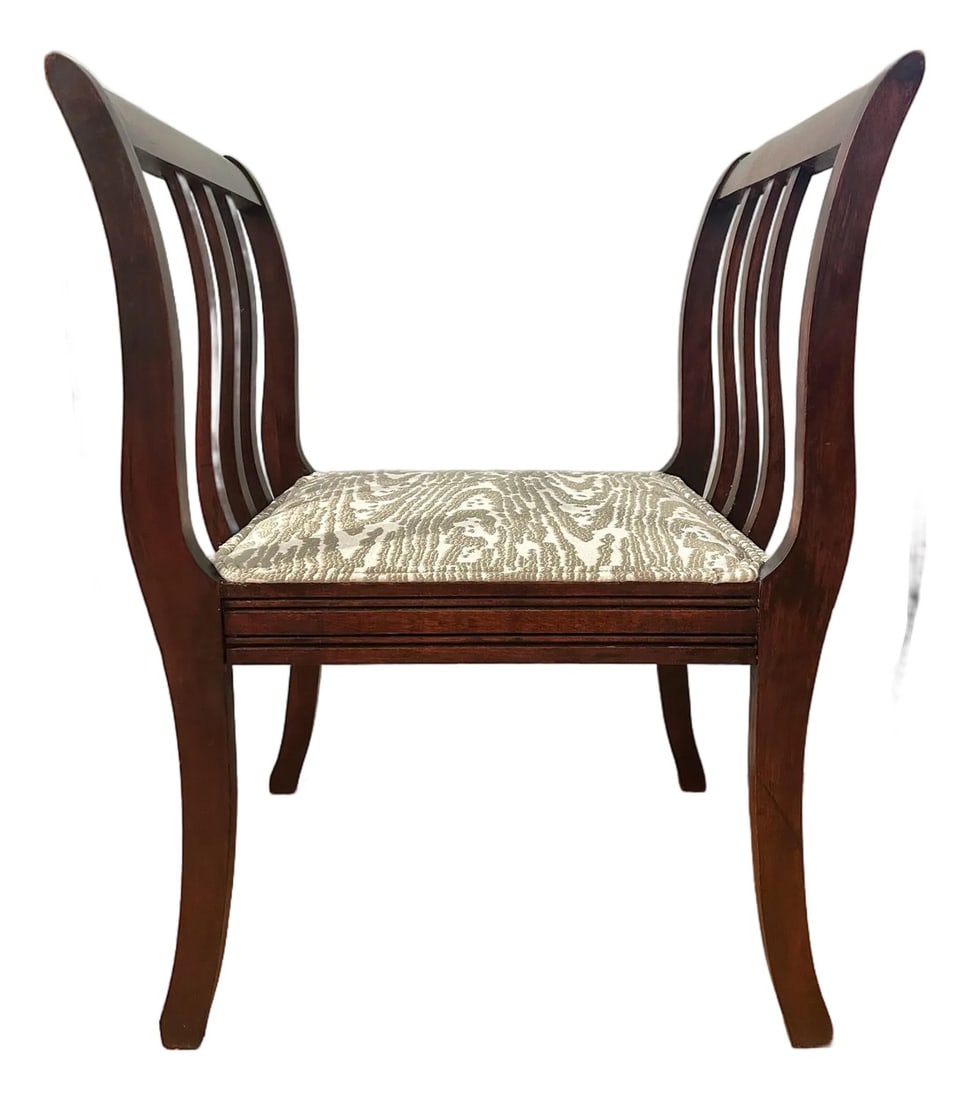 1940s Regency Revival Mahogany High-Arm Hall Bench With Upholstered Seat and Velvet Lumbar Pillow: Elegant mid-20th century mahogany hall bench featuring dramatic high scrolled arms with open vertical splats and graceful saber legs. The clean architectural lines and rich mahogany finish reflect the