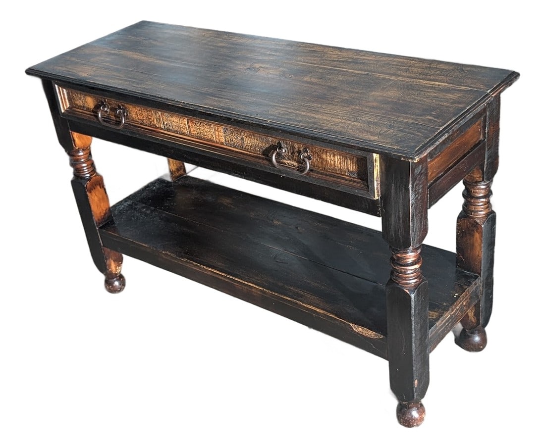 MId 20th Century Rustic Distressed Black Wood Console Table With Drawer and Equestrian Ring Pulls: Bring a touch of timeless rustic elegance to your home with this striking console table, perfect for an entryway, hallway, or behind a sofa. Handcrafted from solid wood, it features a deep black