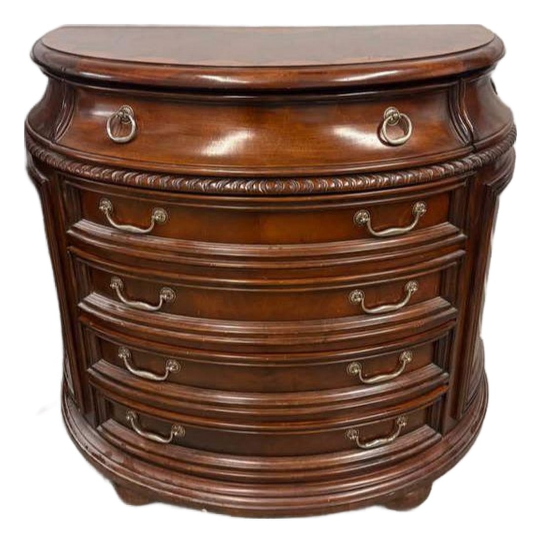 1950s Elevate Your Home With the Timeless Elegance of Our Regency-Style Mahogany Bowfront Chest, a M: Key Features: Exquisite Craftsmanship: Hand-carved details and rich mahogany finish showcase superior artistry. Regal Design: The gracefully curved bowfront silhouette and rope-like molding evoke