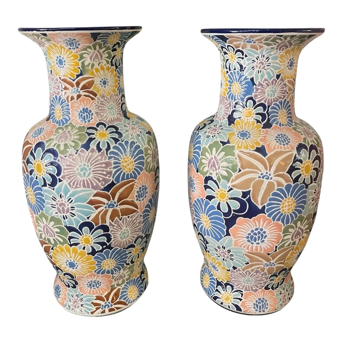 Pair of Hand-Painted Dutch Floral Vases: This eye-catching pair of ceramic vases, sourced from Holland, features a dense, "thousand flowers" (millefleur) style motif. Each piece is meticulously hand-decorated with an all-over tapestry of