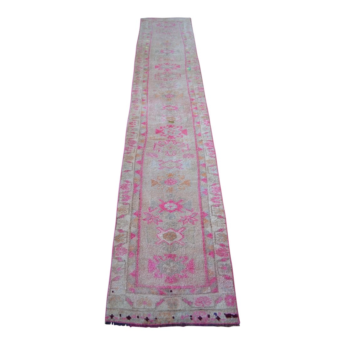 2x11 Ft Approx Pink Kurdish Herki Hand-Knotted Distressed Runner: Offered is an one of a kind Kurdish runner rug, made in Anatolia approximately 50-60 years ago. The beautiful wool on cotton low pile features multicolored floral patterns on a wavy red background