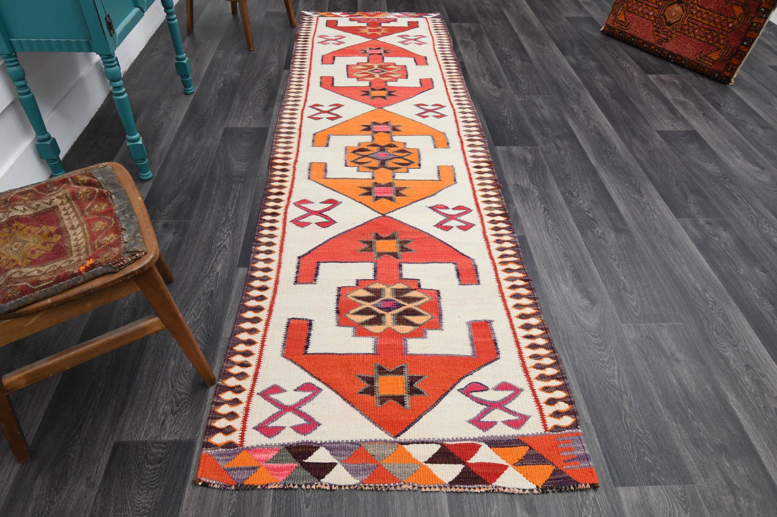 3.1x10 ft, White & Red KILIM Runner: Title: 3.1x10 ft, White & Red KILIM Runner Description: This Turkish one-of-a-kind Vintage Flatweave Kilim Rug is hand-knotted and handwoven by the most skilled artisans who use pure wool, in vibrant,