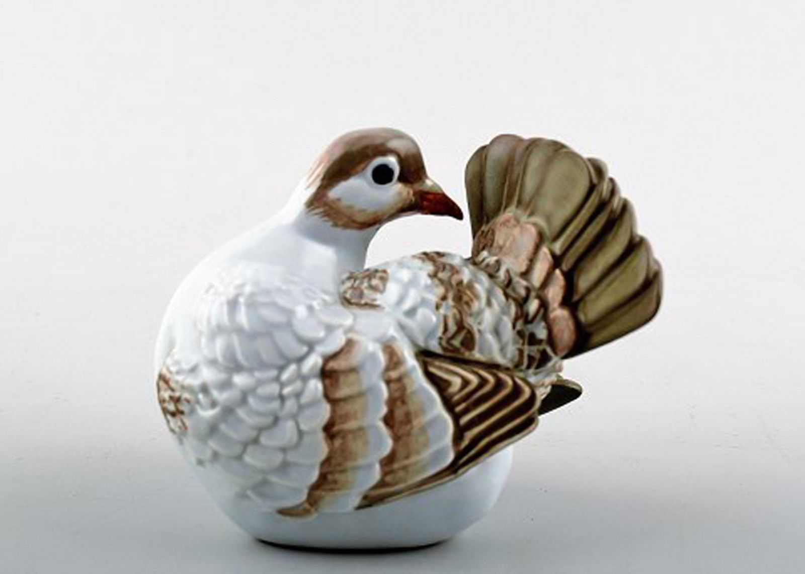 Royal Copenhagen bird in faience. - 2