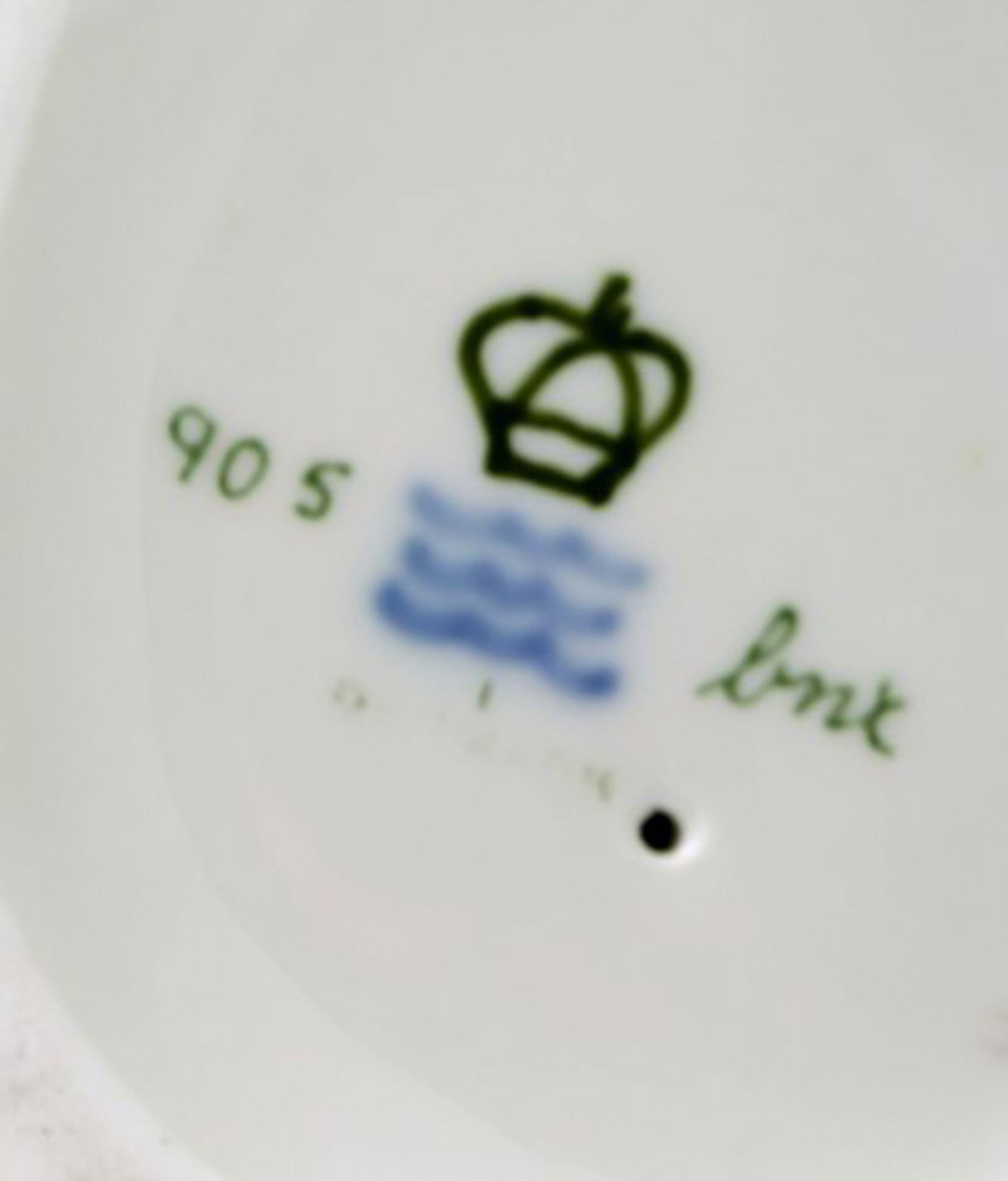 Royal Copenhagen porcelain figurine in high quality over glaze. Young boy. Model number 905. Dated - 7