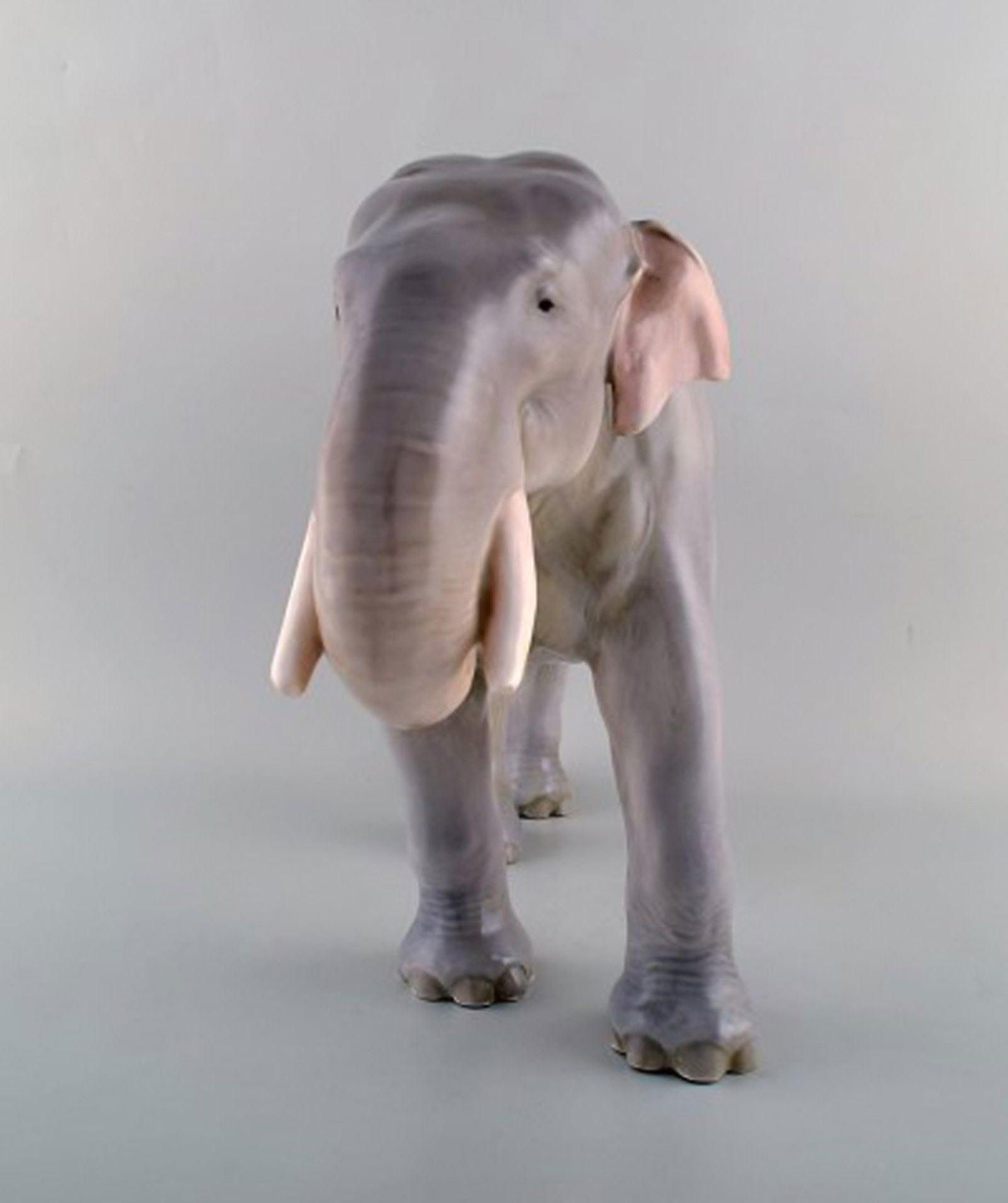 Theodor Madsen for Royal Copenhagen. Rare porcelain figurine. Colossal elephant. Dated ca. 1910. - 2