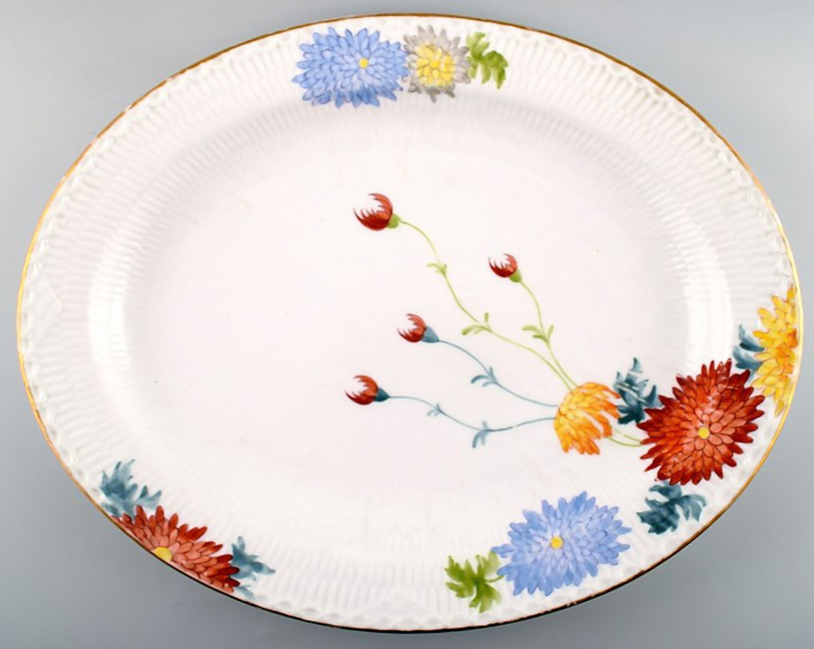 Antique and rare Royal Copenhagen large dish decorated with flowers.: Title: Antique and rare Royal Copenhagen large dish decorated with flowers. Description: Antique and rare Royal Copenhagen large dish decorated with flowers. Measures 40.5 cm. Number 93/534. Early