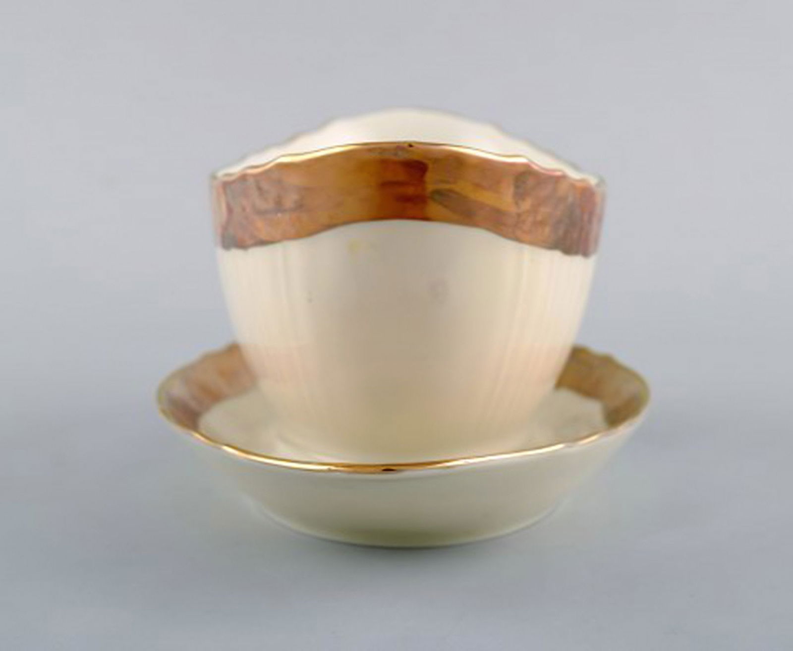 Royal Copenhagen porcelain sauce boat with floral motifs and gold border. Mid 20th century. Two - 4
