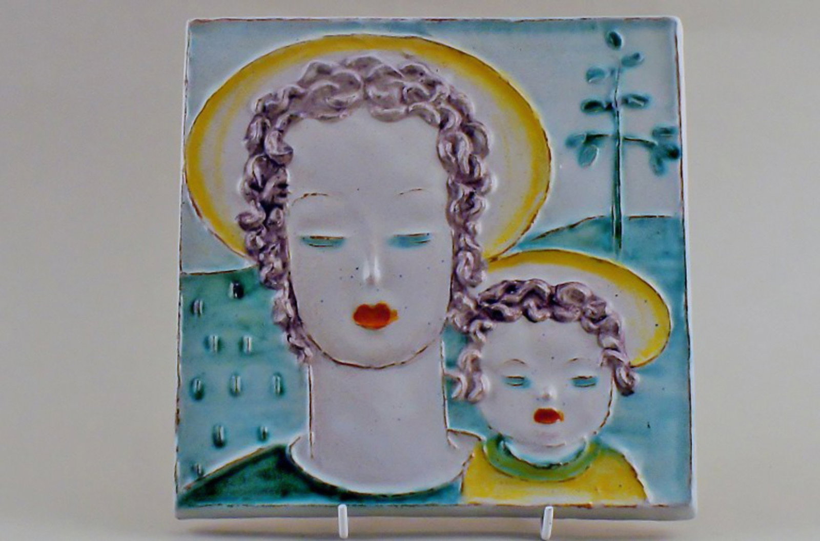 Goldscheider, Vienna Art Deco plaque of earthenware.: Title: Goldscheider, Vienna Art Deco plaque of earthenware. Description: Goldschneider, Vienna Art Deco plaque of earthenware, ca. 1930. Woman and child in profil. In perfect condition. Measures 20 x