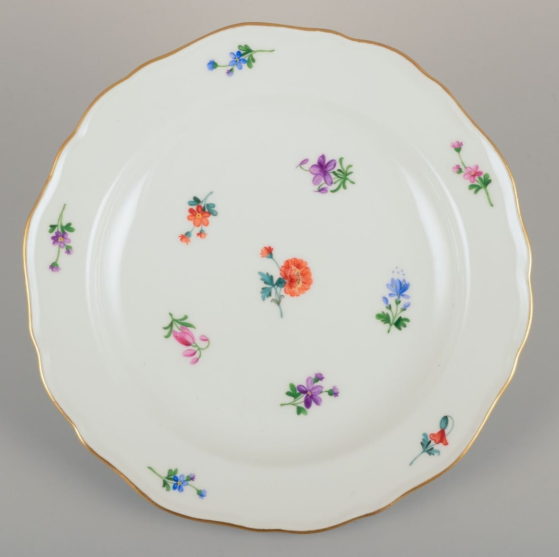 Meissen, Germany. Five porcelain plates with floral motifs, gold rim. Approx. 1920s/1930s. - 5