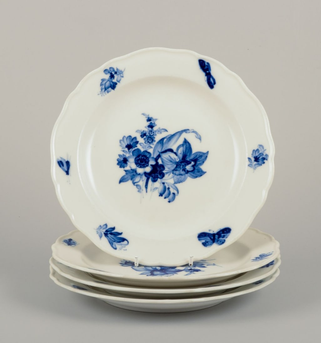 Meissen, Germany. Four porcelain lunch plates with floral motifs and insects in blue. Approx. (1 of 7)
