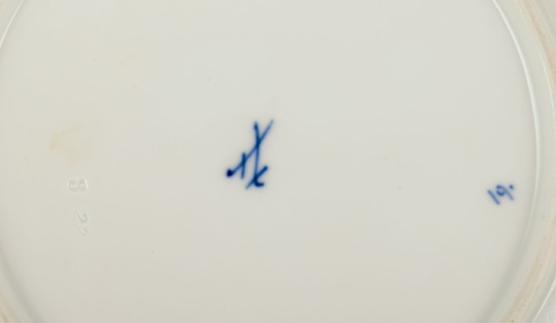 Meissen, Germany. Four porcelain lunch plates with floral motifs and insects in blue. Approx. - 6