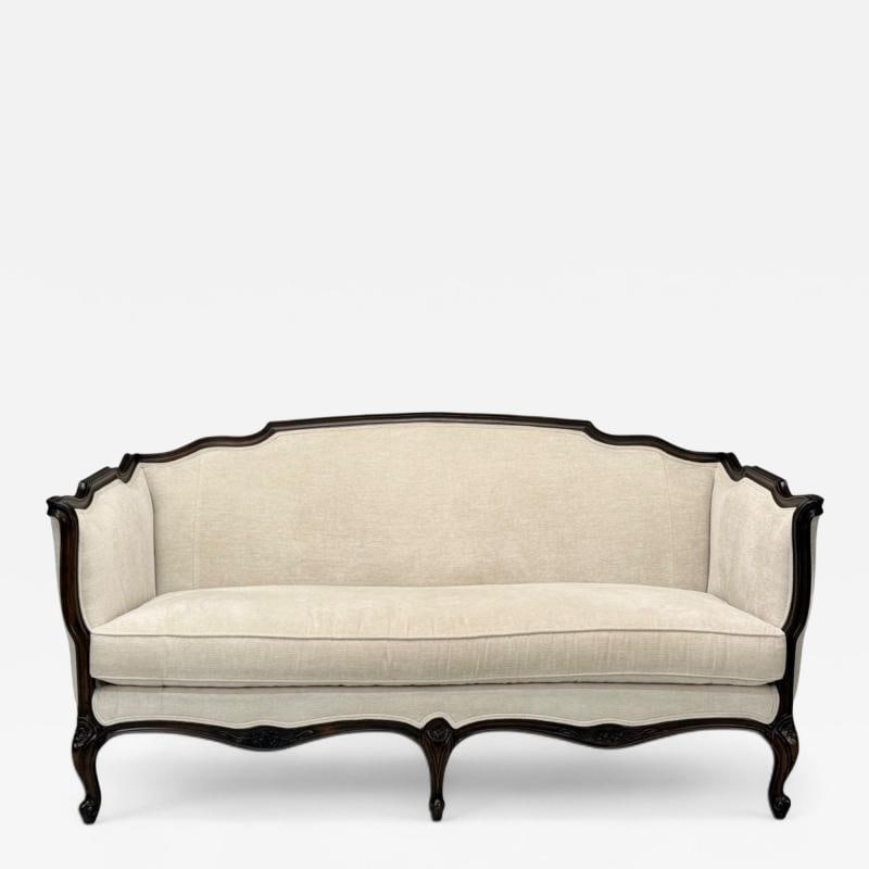 Louis XV Style, Mahogany, Beige Fabric, Sofa, France, 20th C.: Title: Louis XV Style, Mahogany, Beige Fabric, Sofa, France, 20th C. Description: Louis XV Style, Mahogany, Beige Fabric, Sofa, France, 20th C. A dark stained Mahogany sofa in the Louis XV style desig