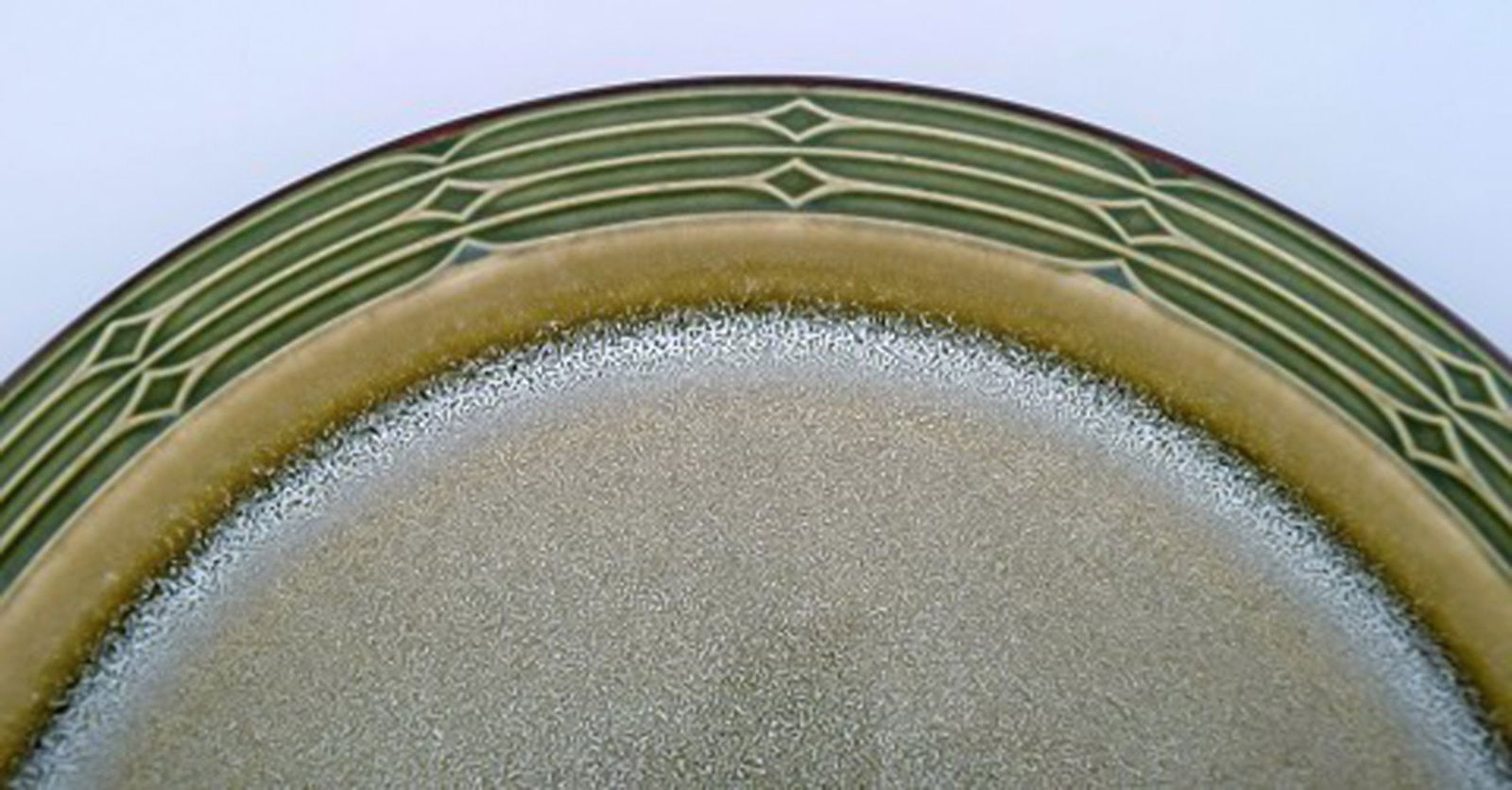 Jens H. Quistgaard (1919-2008) for Bing & Grondahl. Large round "Rune" dish in glazed stoneware. Two - 3