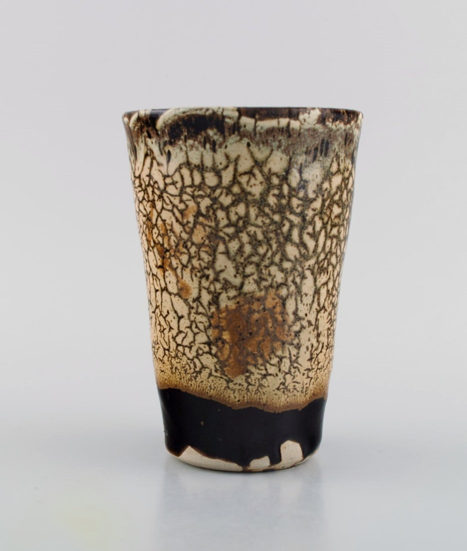 Isabelle Dacourt, France. Unique vase in glazed stoneware. Beautiful crackled glaze in cream and: Title: Isabelle Dacourt, France. Unique vase in glazed stoneware. Beautiful crackled glaze in cream and dark shades. Late 20th century. Description: Isabelle Dacourt, France. Unique vase in glazed