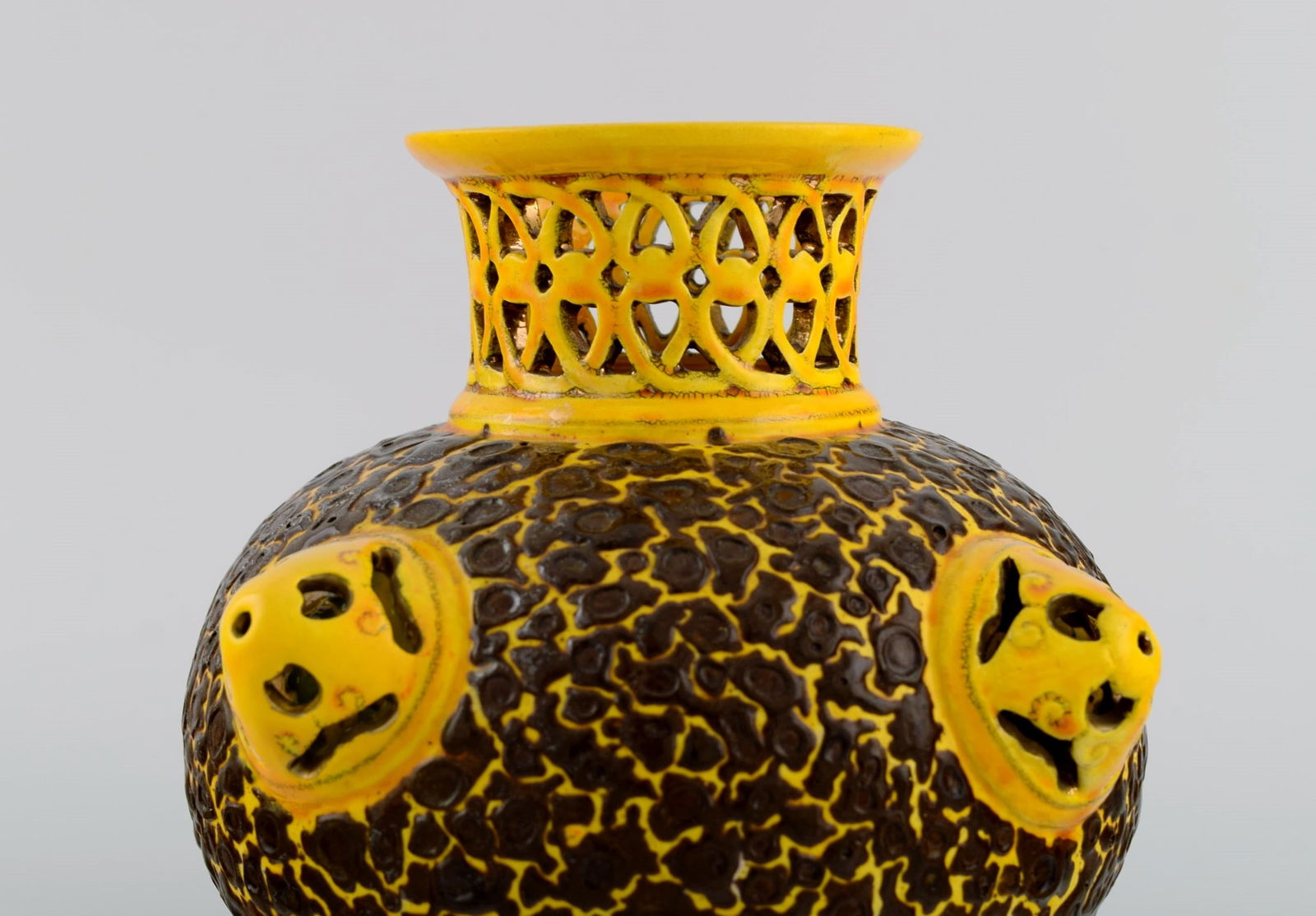 Antique Zsolnay vase in openwork glazed ceramics. Beautiful glaze in yellow and brown shades. Dated - 4