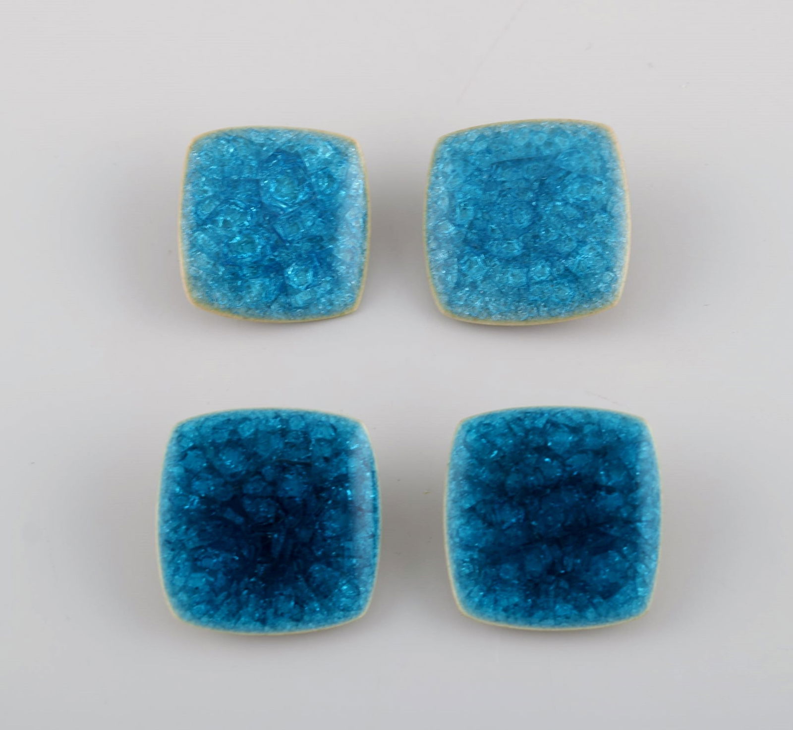 Ole Bjørn Krüger (1922-2007), Danish sculptor and ceramicist. Two pairs of unique ear: Title: Ole Bjørn Krüger (1922-2007), Danish sculptor and ceramicist. Two pairs of unique ear clips in glazed stoneware. Beautiful glaze in blue tones. 1960s / 70s. Description: Ole