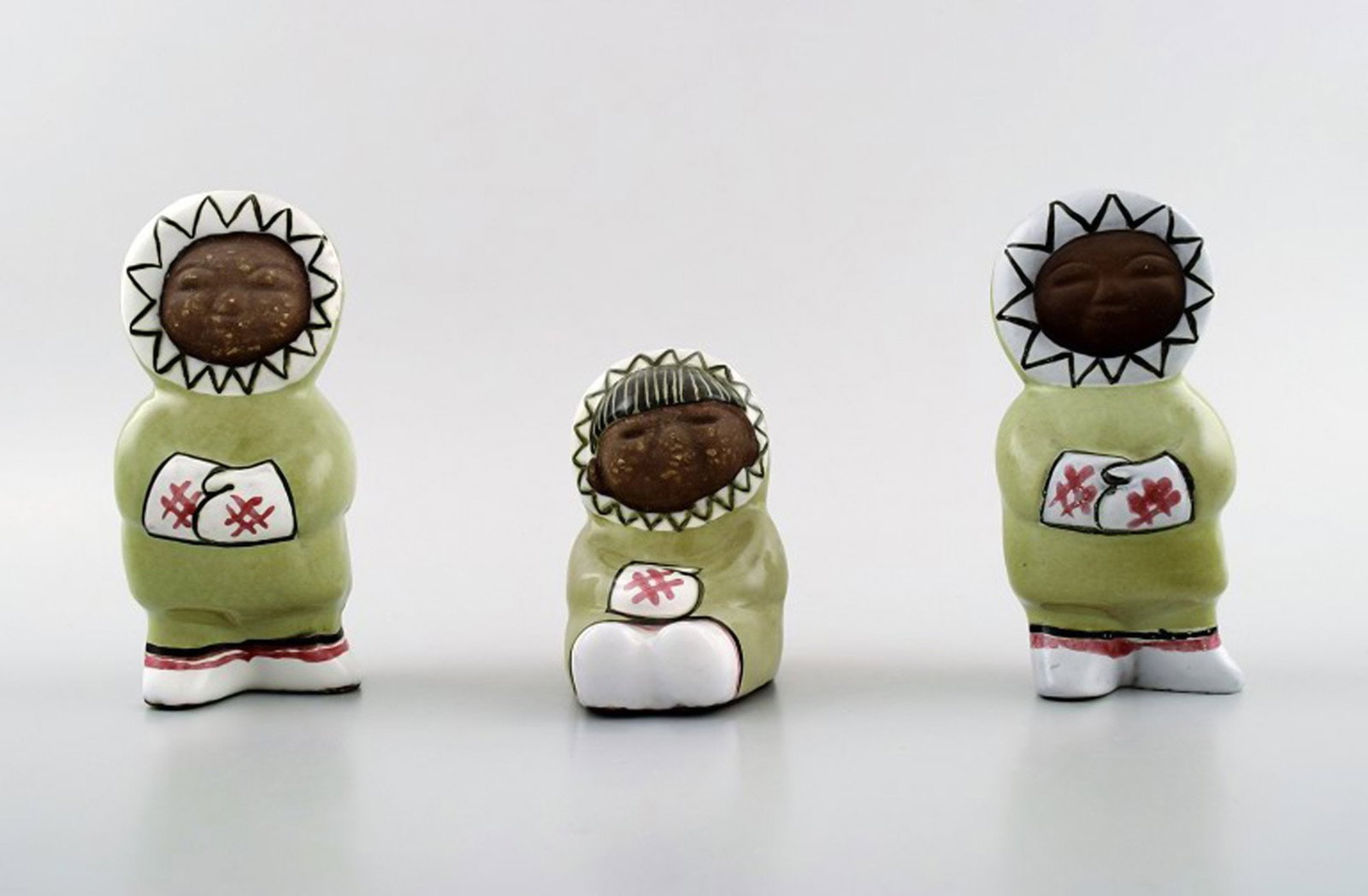 Collection of Upsala-Ekeby art pottery figurines, Eskimo children.: Title: Collection of Upsala-Ekeby art pottery figurines, Eskimo children. Description: Collection of Upsala-Ekeby art pottery figurines, Eskimo children. Total of three figures. Sweden mid. 20 c.