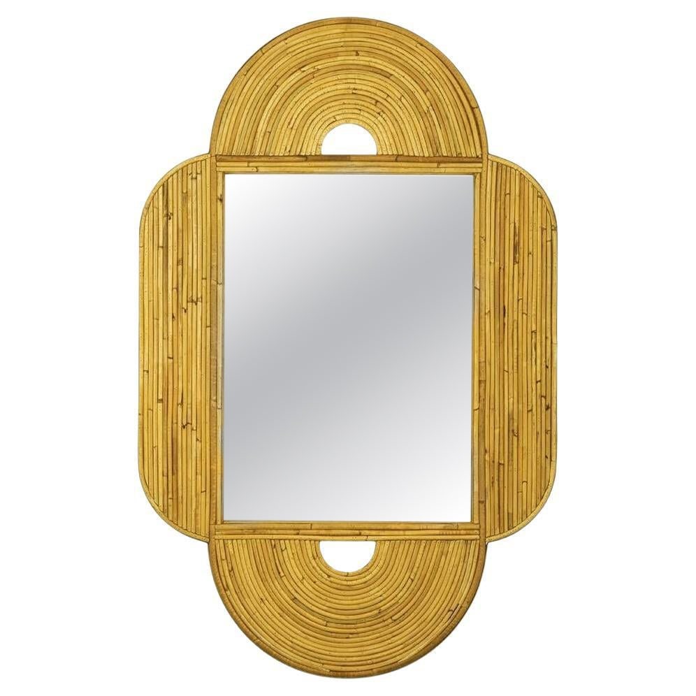 Large 47"x 30" Italian Restored Streamline Split Reed Rattan Arched Wall Mirror: Title: Large 47"x 30" Italian Restored Streamline Split Reed Rattan Arched Wall Mirror Description: Restored reed rattan arched wall mirror featuring a streamlined 25-strand arch along the top and
