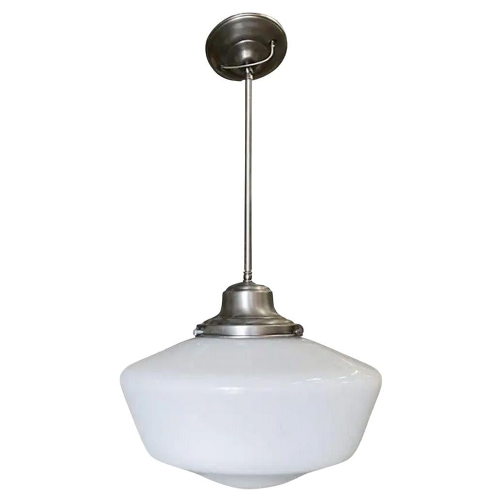1930s Art Deco Ceiling Pendant With School House Glass Globe: Title: 1930s Art Deco Ceiling Pendant With School House Glass Globe Description: Rare Art Deco chrome ceiling pendant with a milk glass school house style glass globe. Can be on a chain or a pole