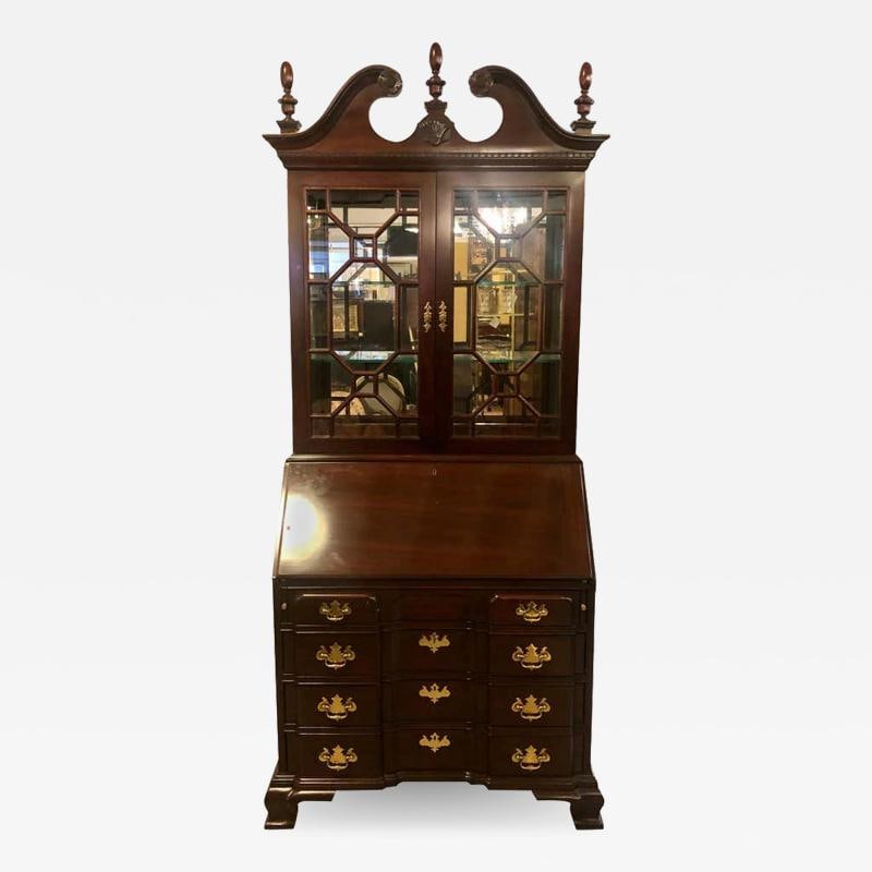 Pennsylvania House Secretary Desk / Bookcase in the Chippendale Style: Title: Pennsylvania House Secretary Desk / Bookcase in the Chippendale Style Description: Pennsylvania House secretary desk / bookcase. This fine mahogany block front two-piece Chippendale style secre