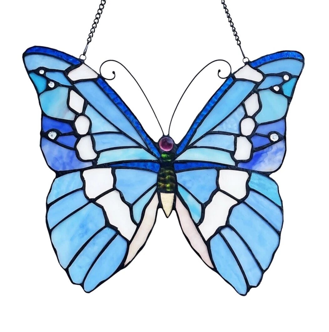 13 1/2" Blue Butterfly Stained Glass Window Hanging Panel Suncatcher: Title:13 1/2" Blue Butterfly Stained Glass Window Hanging Panel Suncatcher Description:Description 13.5" Wide x 12" tall 21" Hanging height Great reproduction glass butterfly panel. This piece is hand